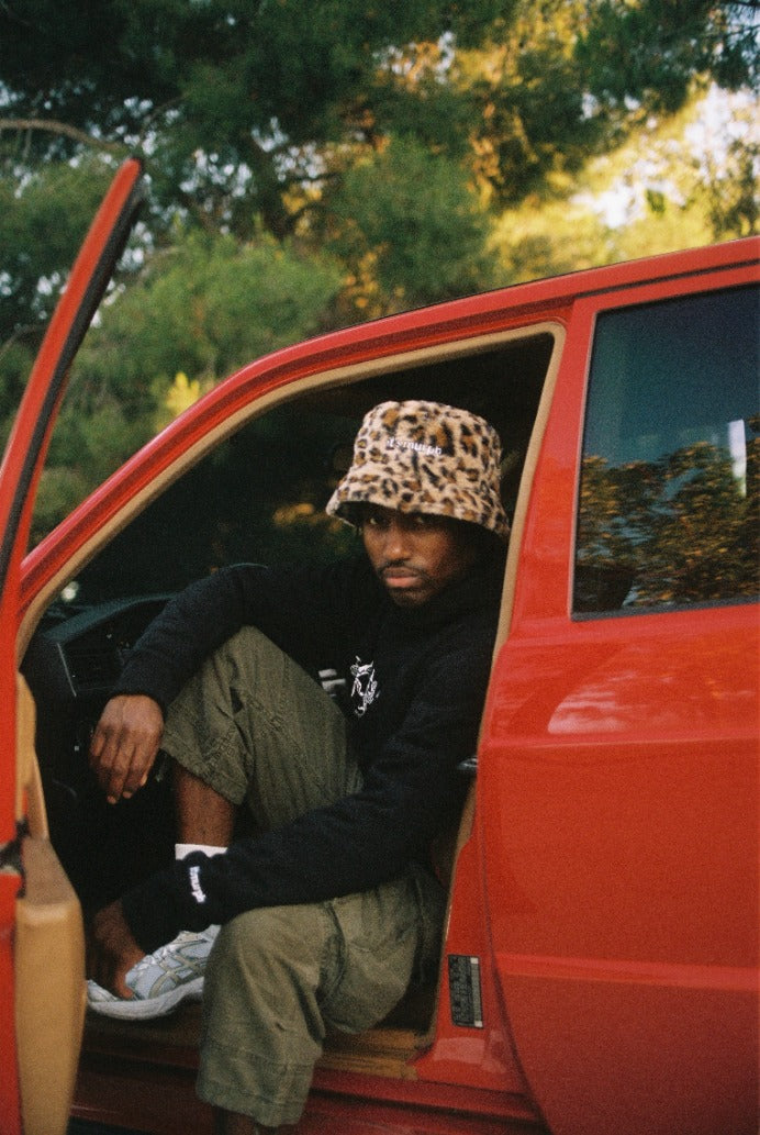It's Murph Cheetah Furry Reversible Bucket Hat